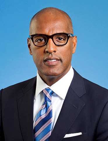 Curtis L. Dickinson, JP, MP